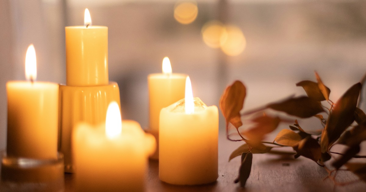 Memorial candles lit in remembrance of a loved one